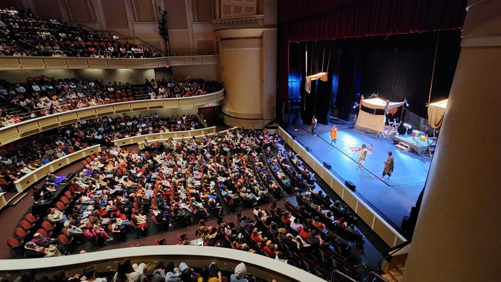 Photo of the audience and stage at Merrill Auditorium